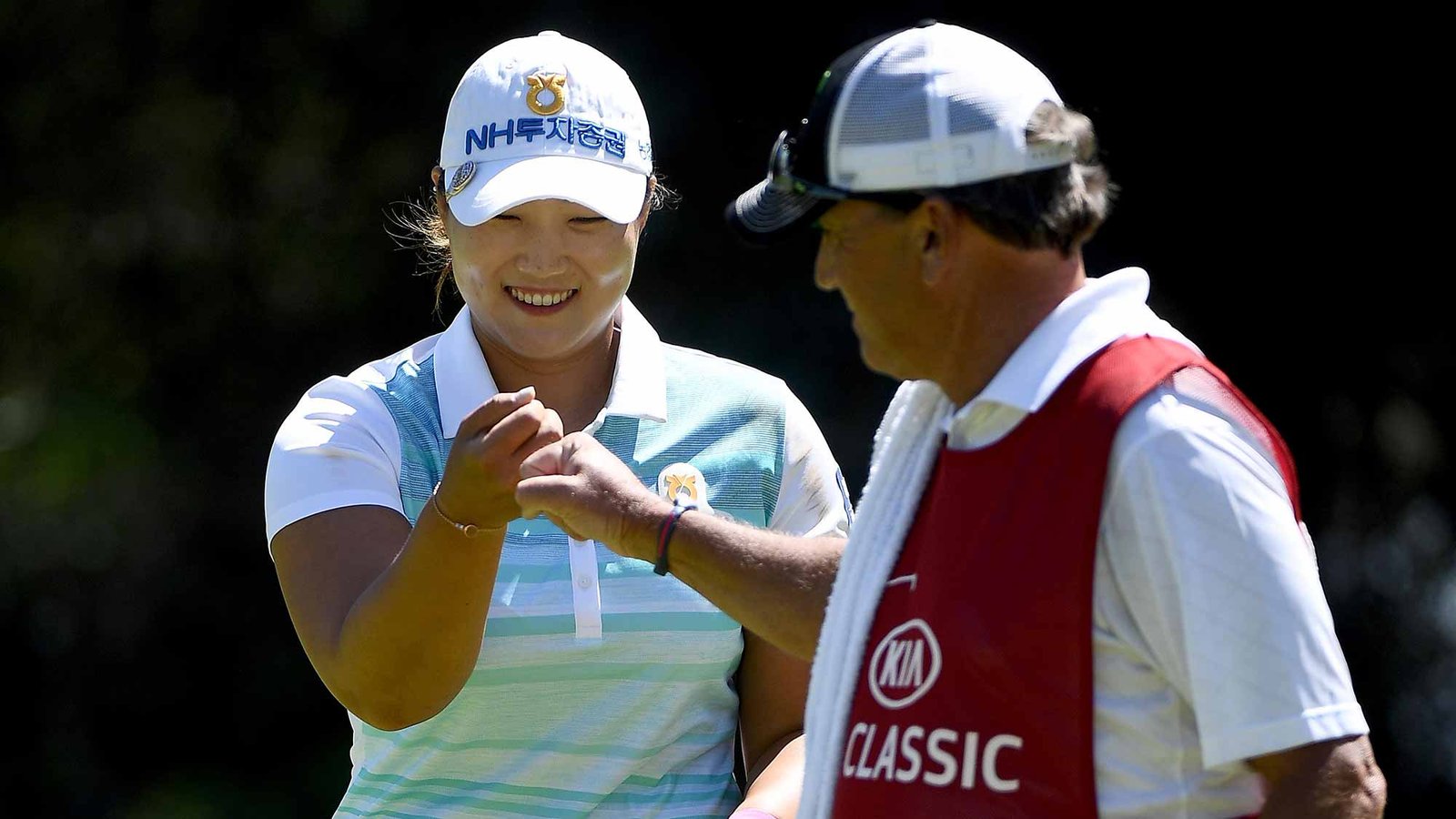 Mirim Lee with caddie