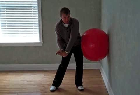 Using a balance ball to train your downswing