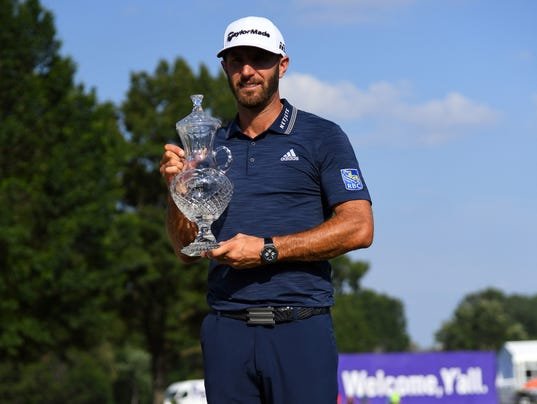 Dustin Johnson with FedEx St. Jude trophy