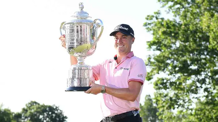 Justin Thomas hoists seond PGA Championship trophy