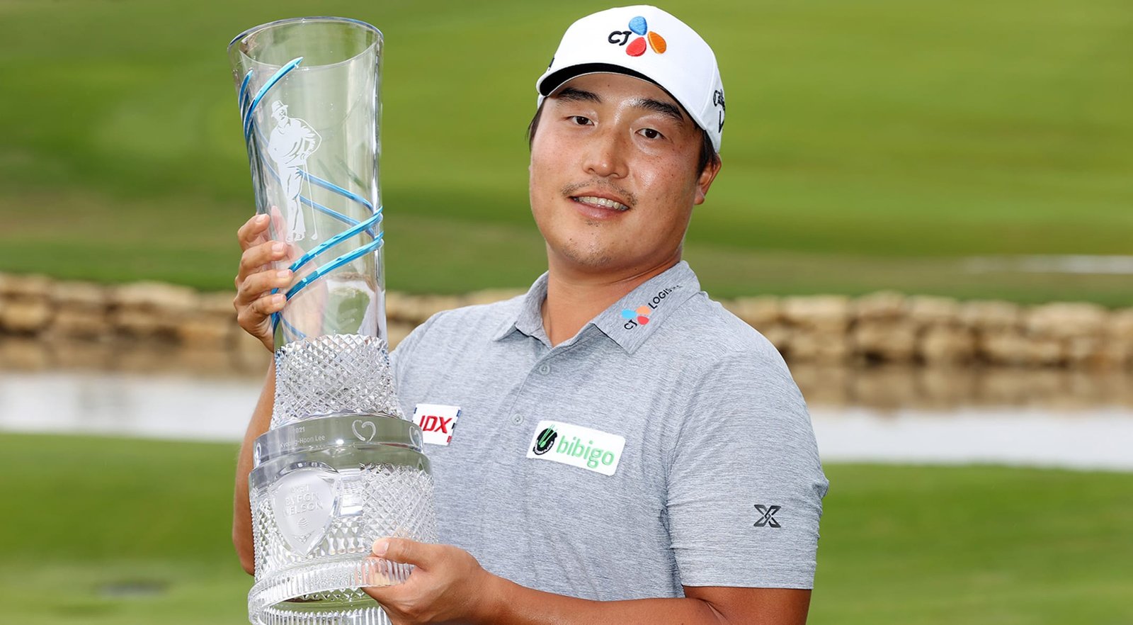 K.H. Lee with AT&T Byron Nelson trophy