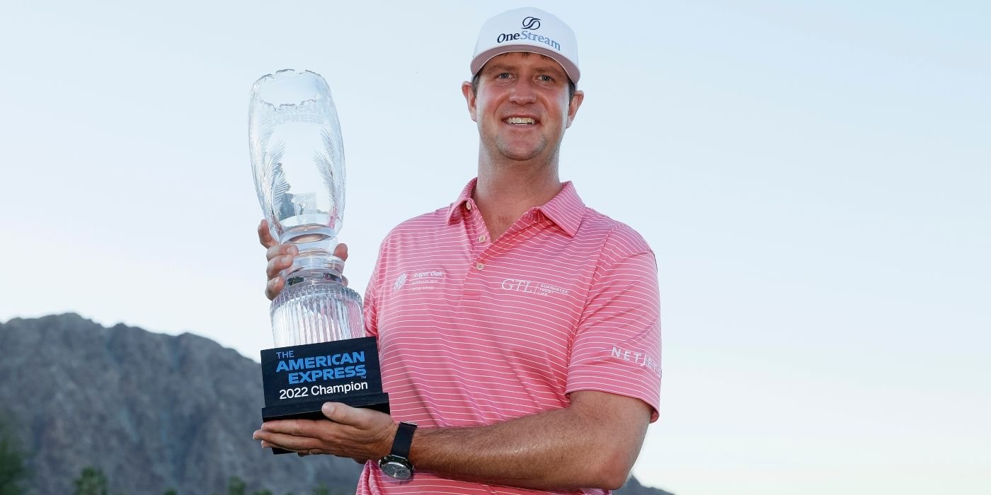Hudson Swafford with the American Express trophy