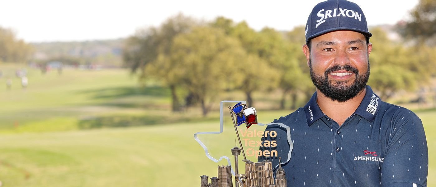 JJ Spaun with the Valero trophy