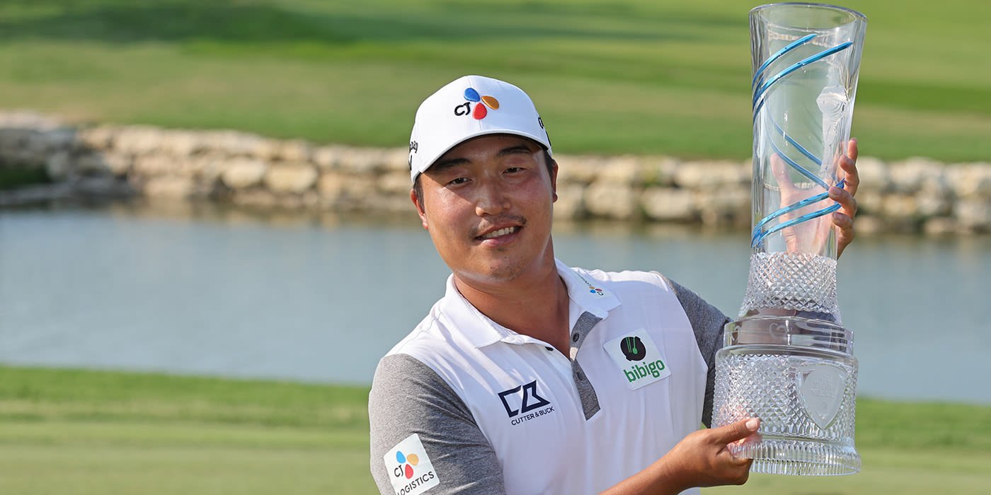 K.H. Lee with Byron Nelson trophy