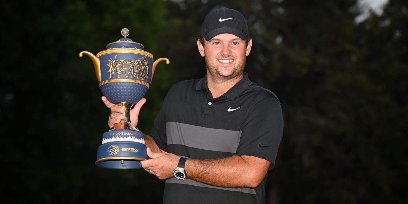 Patrick Reed with the WGC trophy