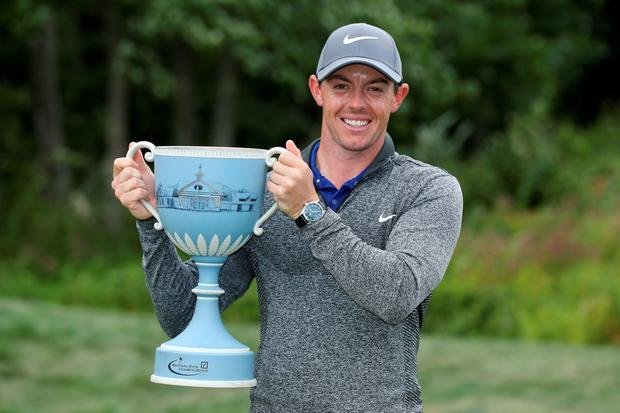 Rory McIlroy with Deutsche Bank trophy