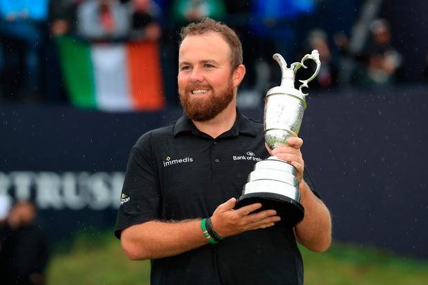 Shane Lowry hoists the Claret Jug
