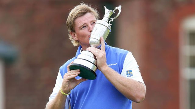 Ernie kisses the Jug