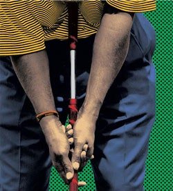 Vijay using a palm-facing putting grip