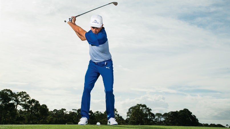 Rickie Fowler at top of full wedge swing