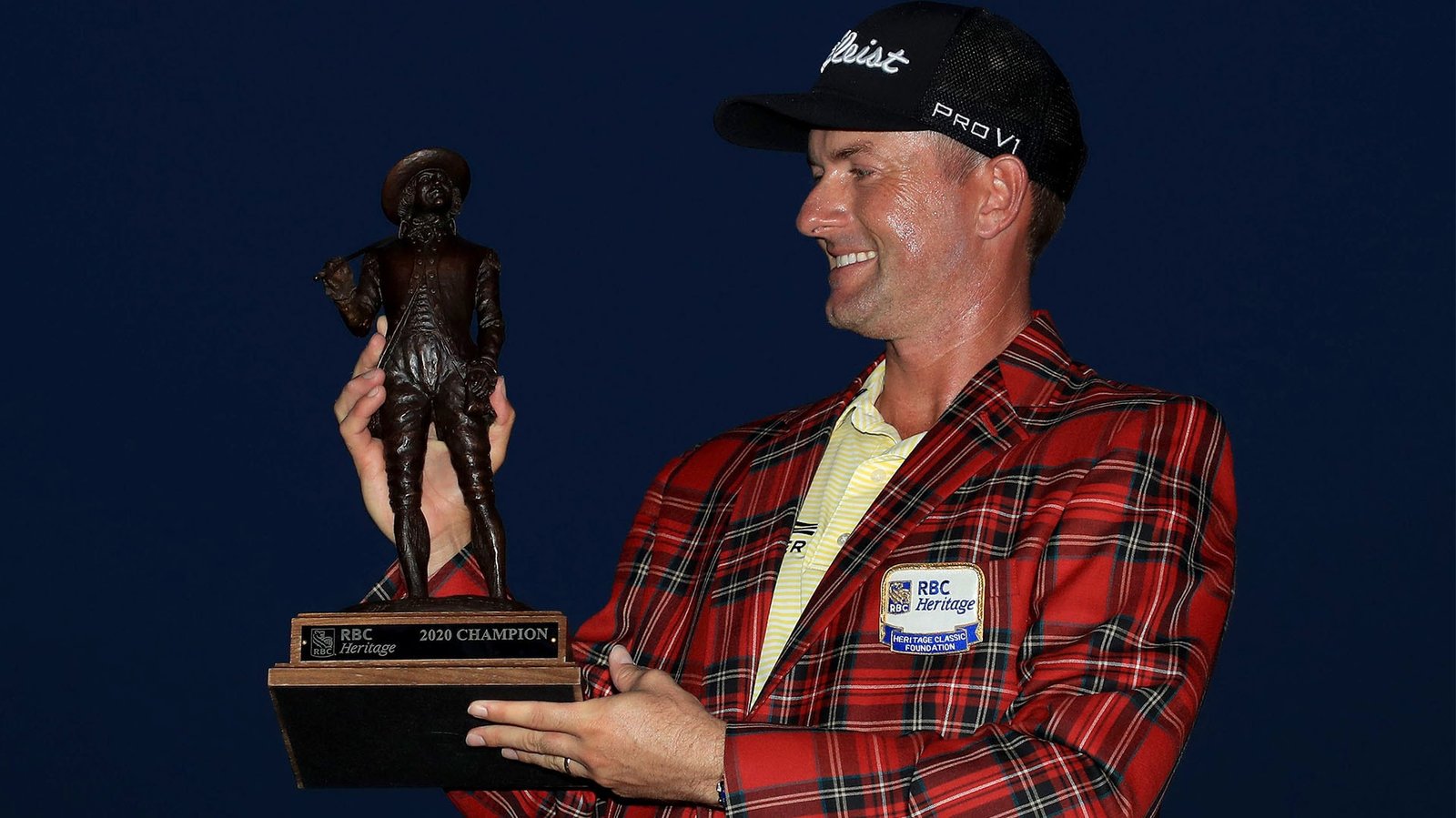 Webb Simpson with the RBC Heritage trophy and tartan jacket