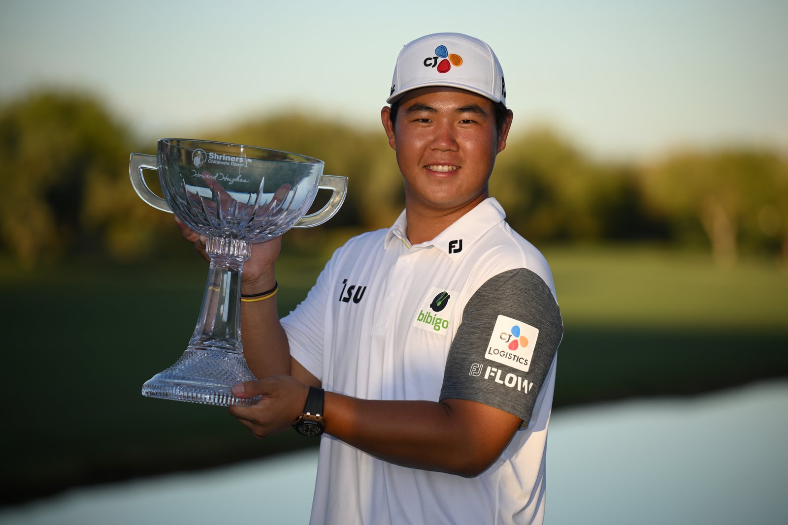 Tom Kim with Shriners trophy